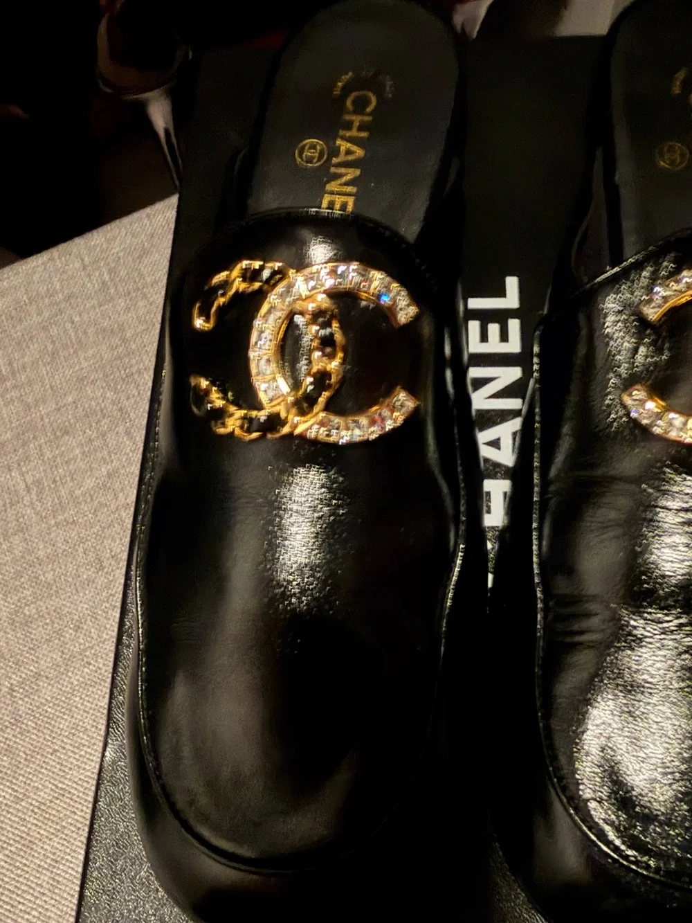 CHANEL Black Leather Crystal CC Slip-On Mules season fall 2024 collection